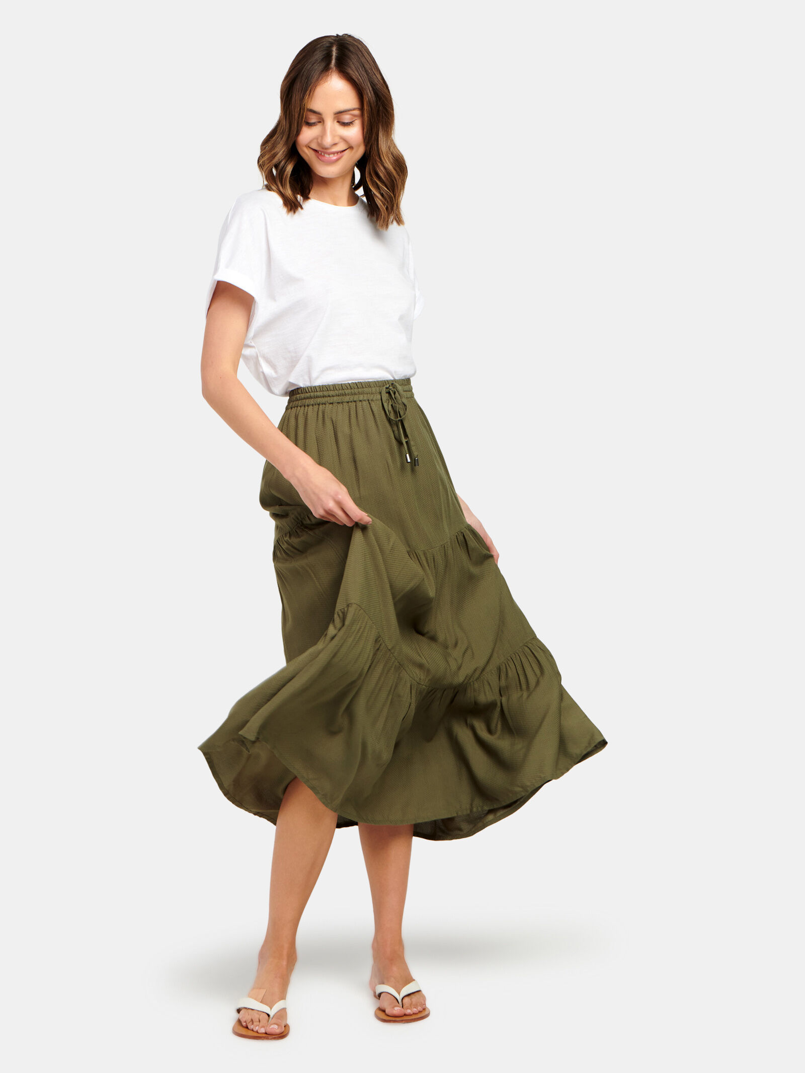 Green skirt nz top